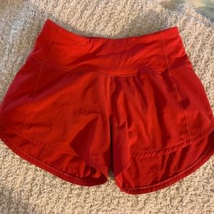 red lululemon speed up shorts 4”